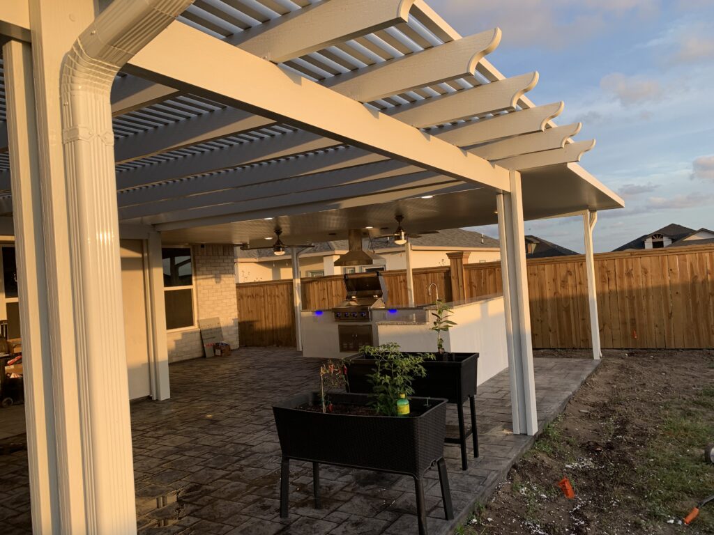 Custom outdoor kitchen and pergola in a Houston, TX outdoor living space